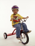 4 Year Old Boy Posing on His Tricycle  New York  New York  USA