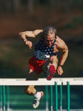 Mature Athlete Competing in Hurdles Race  Atlanta  Georgia  USA