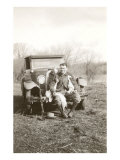 Man on Bumper of Vintage Car with Dead Ducks