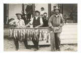 Men with Row of Caught Fish