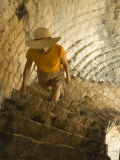 Tourist climbing stone steps of 15th century fort  Ston  Dalmatia  Croatia