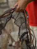 Man mending fishing nets  Stari Grad Town  Hvar Island  Dalmatia  Croatia
