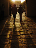 Tourists silhouetted in the entrance to Humayun's Tomb  Nizamuddin  India