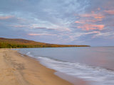 Vivid sunrise over Lake Superior at Porcupine Mountains State Park  Michigan  USA