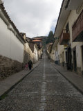 Locals Walking Up Cobblestone  Cusco  Peru
