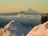 Snow-covered view of Mt Jefferson and Three Sisters Mountains  Oregon  USA