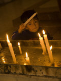 Boy Near Altar of Prayer Candles  Cathedral of Immaculate Conception  Cuenca  Ecuador