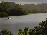 Quichua Indian in Dugout Canoe  Napo River  Amazon Rain Forest  Ecuador