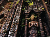 Detailed Carvings and Statues of Hindu Deities on a Temple Tower Wall
