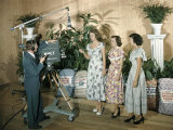 Women Wearing Dresses Made from Feed Sacks are Filmed for Television