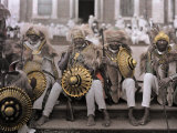 Ethiopia's Veterans  in Traditional Costumes  Sit on Cathedral Steps