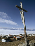 Crucifix Overlooks an Inuit Town Beside Frozen Eclipse Sound