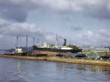 Tugboat Pushes Barge Loaded with Cars Through Houston's Ship Canal