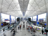 Bustling Crowds Pass Through the Main Terminal at the Airport