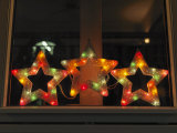 Three Christmas Lights Sitting in a Window Display  Denmark