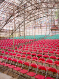 Chairs in a Makeshift Theatre Made of Bamboo Poles and a Tarp