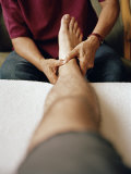 Man Receives a Massage in His Hotel