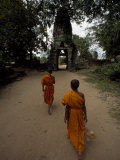 Buddhist Monks Approach the Side Entrance of the Angkor Wat Temples