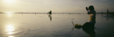 Hindu Balinese Woman Prays on the Beach of Tourist Location Kuta