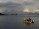 Tahitian's Houseboat Anchored Near Papeete