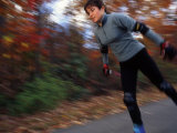 Woman Rollerblades for Her Nordic Ski Race Training