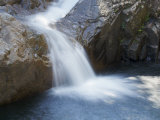 Small Waterfall Cascading over Rough Rocks