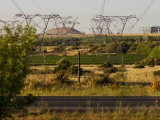 High Voltage Power Transmissions Lines Stretching into the Distance