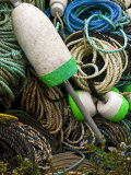 Close-up of a Lobster Buoy Leaning Against Ropes