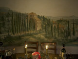 Dining Room Table with Tuscan Landscape Painted on Wall Behind