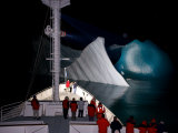 National Geographic Endeavour Cruises Past Icebergs at Night