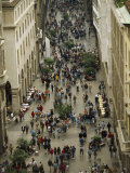 Throngs of People Crowd a Walking Street in Rome
