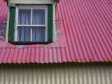 Pink Tink Roof and a Dormer Window with Lace Curtains