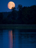 Moon Light Reflecting in Calm Lake Water