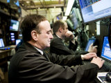 Securities Traders at a Trading Post at the New York Stock Exchange