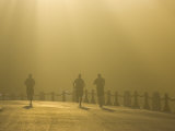 Runners in Fog at Dusk Near the Golden Gate Bridge
