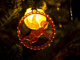 Backlit Cupid on a Very Old Christmas Ornament