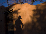 Cowgirl's Shadow on an Adobe Wall