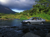 Crossing a Shallow River in a Car