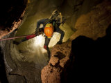 Caver Descending Through Water in Mcbride's Cave