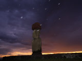 On Easter Island  a Moai Stands Beneath a Rainy Sky