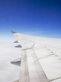 Wing of a Boeing 747 over a Brilliant Blue Sky