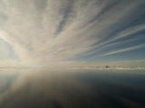 Film of Clouds in Reflected in the Still Water of the Arctic