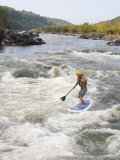 Man on a Stand Up Paddle Board Runs Rapids in the Potomac River