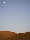 Full Moon over Surrounding Hills