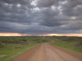 Muddy Road Disappears into the Thunderclouds
