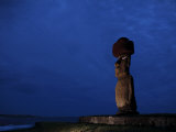 Moai Stands Along the Coast of Easter Island Beneath a Cloudy Sky