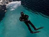 Diver Floating in the Icy Waters of Baffin Island