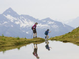 Mother and Her Six Year Old Son Hiking High in the Adamants Range