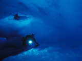 Diver with Safety Line Exploring under Multi-Year Arctic Ice