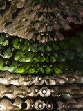 Rows of Green and Clear Glass Bottles Create a Structure